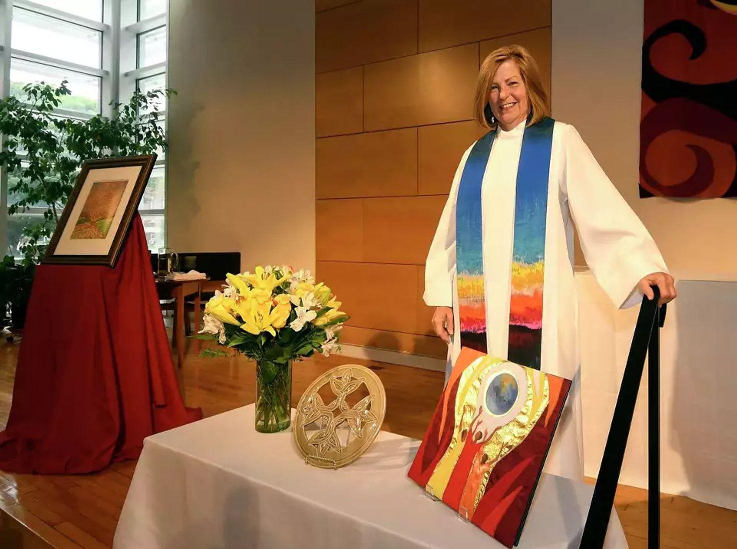 Lynn Kinlan of Guilderland, New York, poses for a portrait before her ordination ceremony as a Roman Catholic priest at a Unitarian church on Saturday, September 8, 2018, in Albany, New York