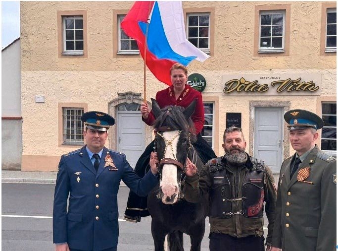 Russia’s totally inconspicuous spies, posing with a horse in Germany (Andrei Mayorov is on the left)