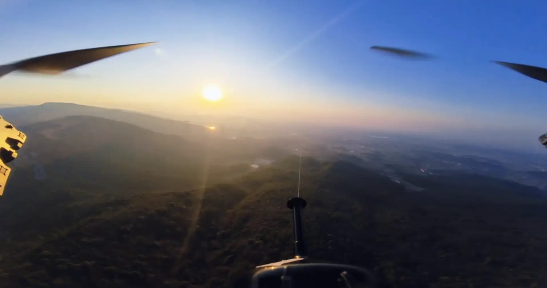 A drone unrolls fiber-optic cable while in flight