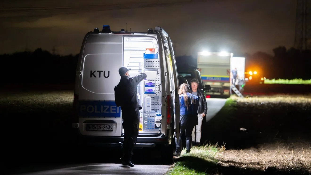 Forensic experts work at the substation in Dormagen, near which a passerby found a suspicious item