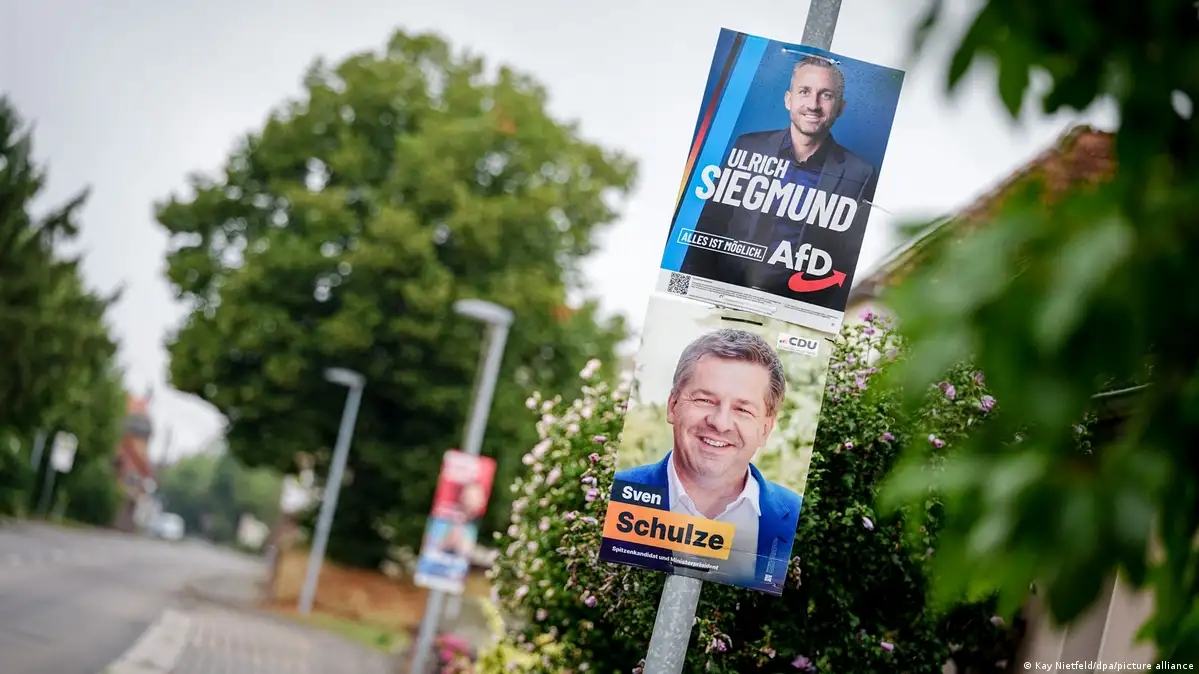Campaign posters for Ulrich Siegmund of the AfD and Sven Schulze of the CDU during the state election in Saxony-Anhalt