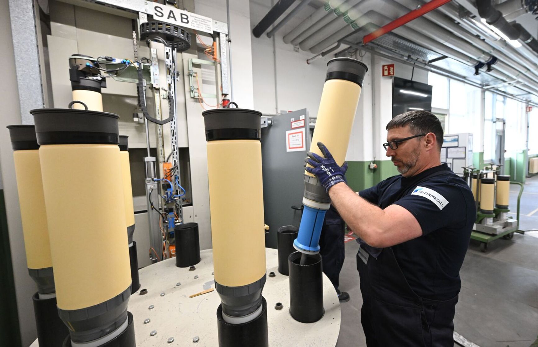 A Rheinmetall employee at an ammunition production facility in the large-caliber weapons division