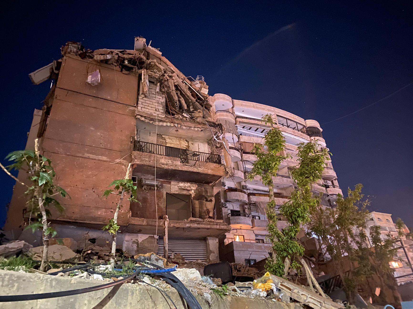 A ruined but not abandoned building in the Haret Hreik neighborhood. There are people living on the first floor