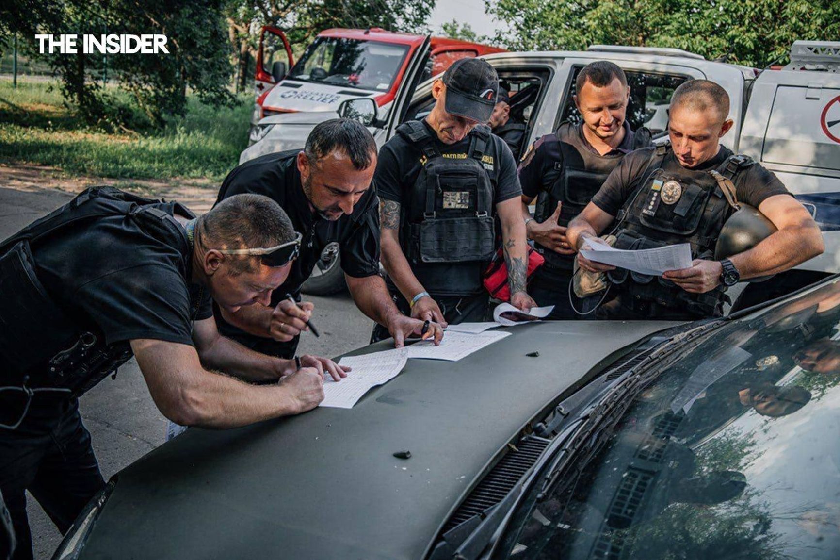 Evacuation group of Children New Generation searching for a house where residents await pickup, Novoivanivka village, Dnipropetrovsk Region