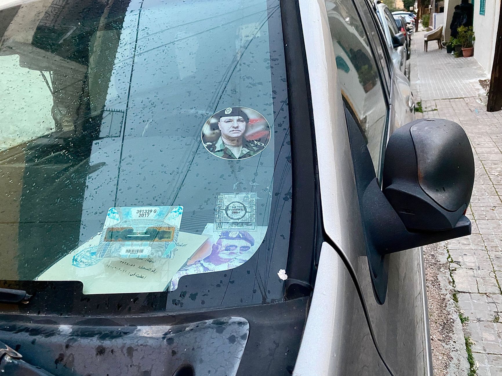 Aoun's portrait on a car in Beirut's Achrafieh neighborhood