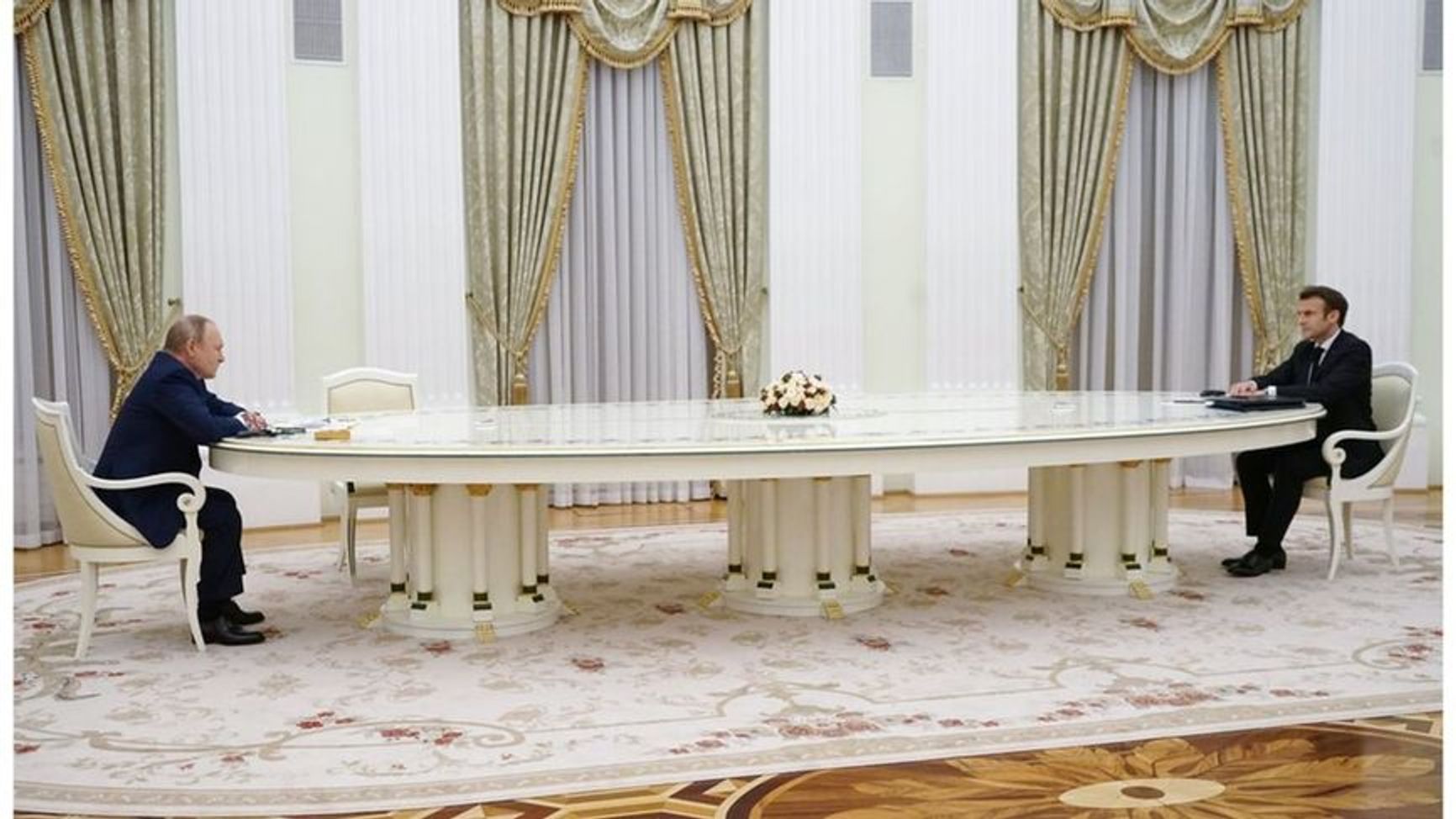 A white 20-foot-long meeting table in the Kremlin became the subject of internet memes after a meeting between French President Emmanuel Macron and Putin in 2022.