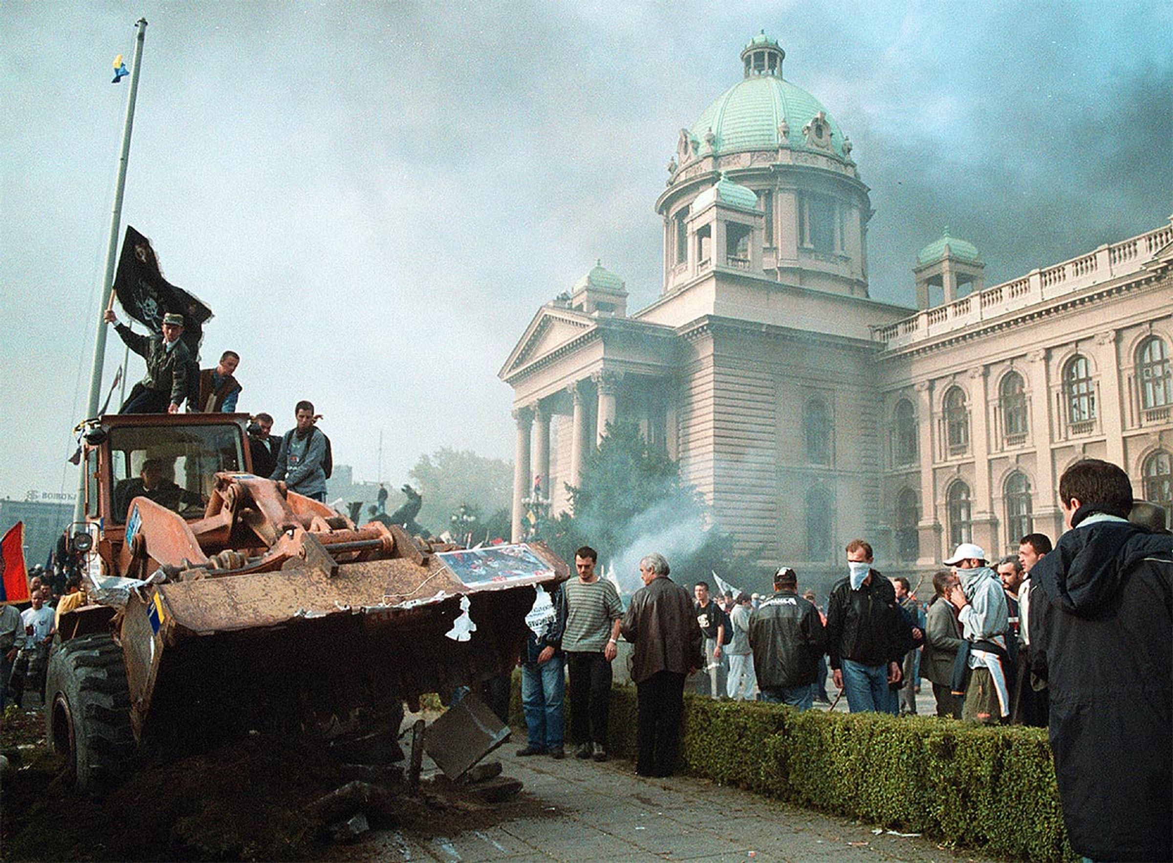 Protesters on a bulldozer in front of the Serbian Parliament, 2000.