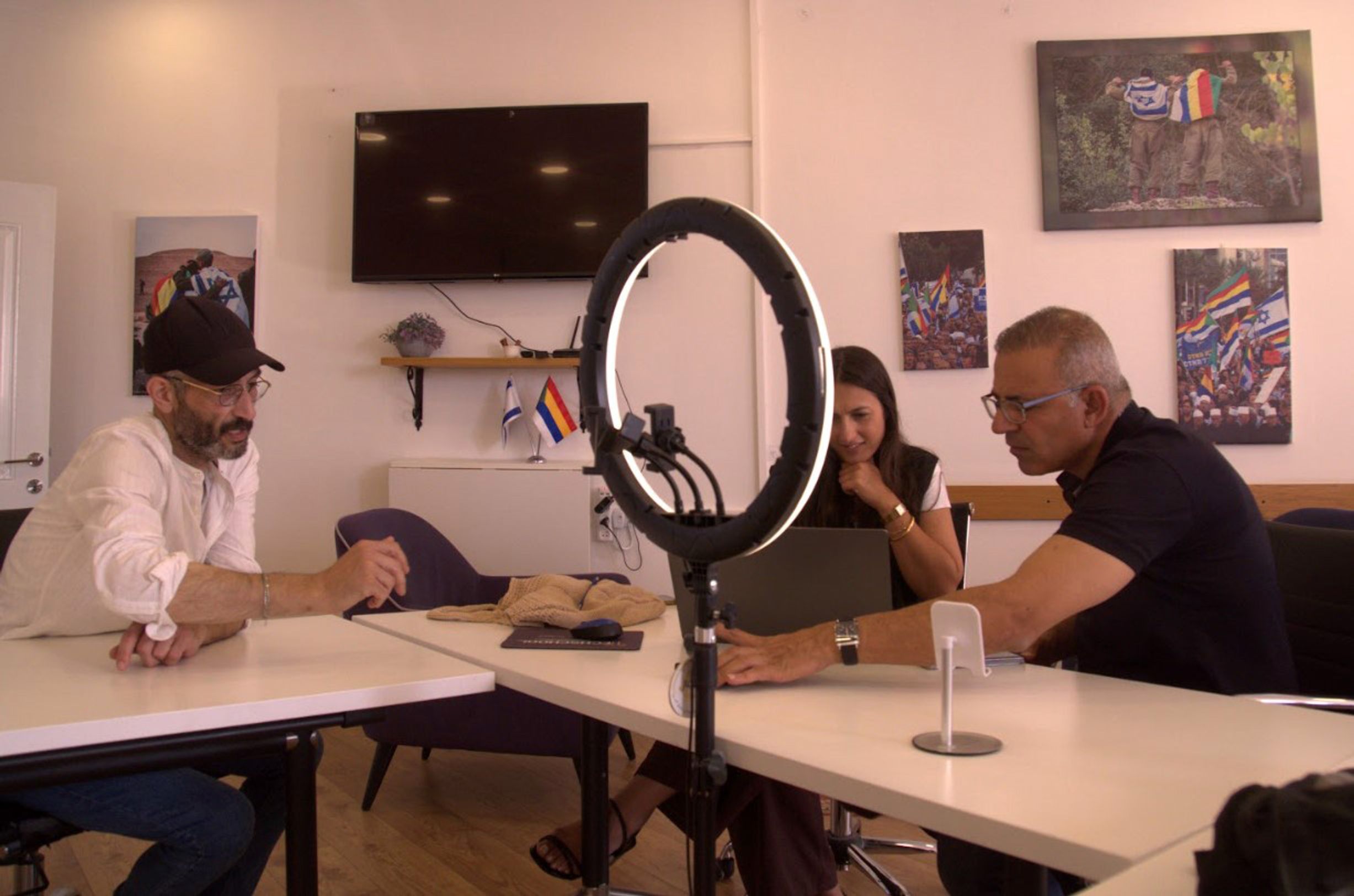 In the photographs on the walls of the state-run Israel-Druze Center, Israeli and Druze soldiers embrace beneath the Israeli and Druze flags.