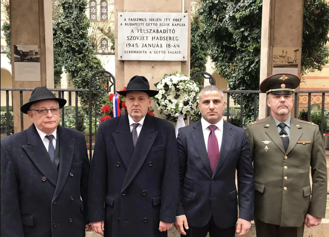 Colonel Oleg Smirnov (in the green military uniform on the far right)